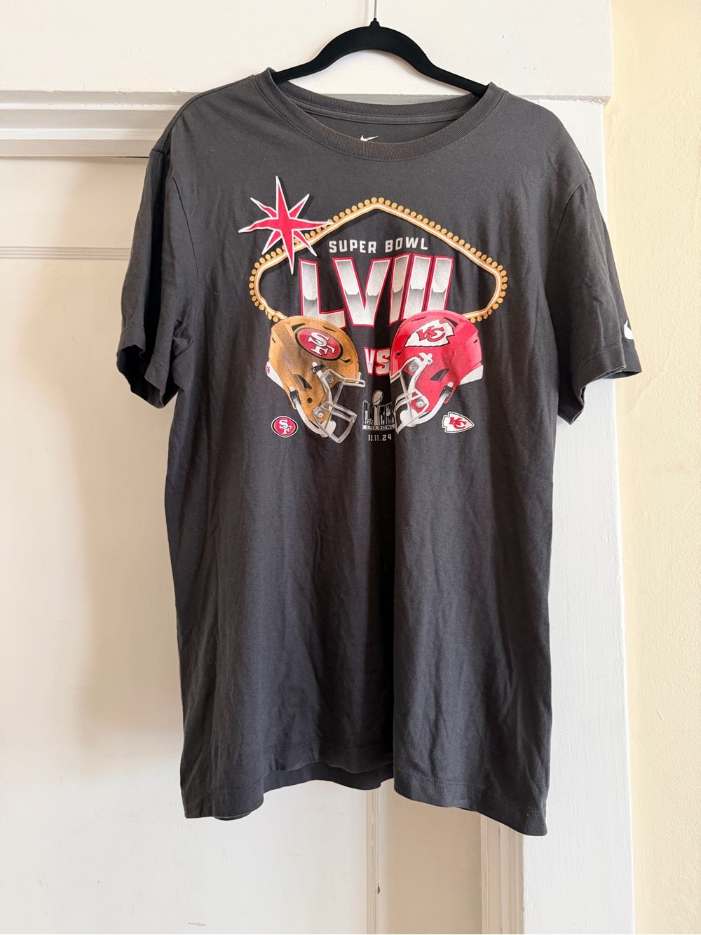 Nike Black Super Bowl LVIII Graphic Tee with Red and Gold Helmets